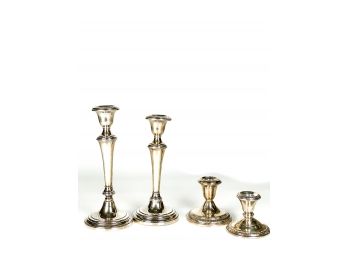(4) WEIGHTED STERLING SILVER CANDLESTICKS