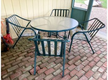 GLASS TOP PATIO TABLE WITH (4) ARMCHAIRS