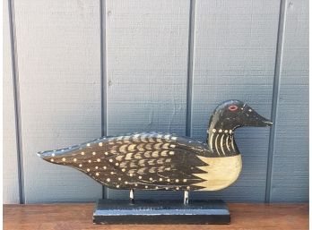 CARVED AND PAINTED DUCK ON STAND