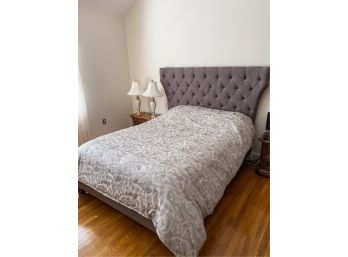 UPHOLSTERED AND TUFTED QUEEN SIZED BED