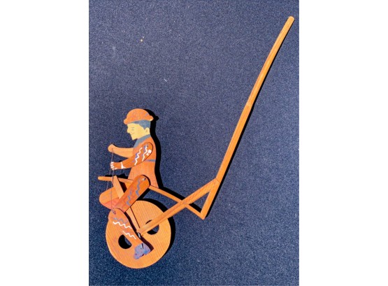 WOODEN FOLK ART PUSH TOY WITH UNICYCLIST