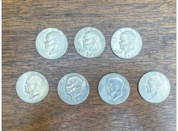COLLECTION OF (7) EISENHOWER DOLLARS