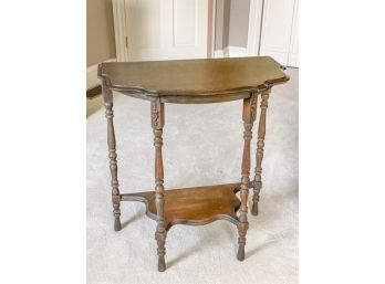 TWO TIERED SERPENTINE CONSOLE TABLE ON TURNED LEGS