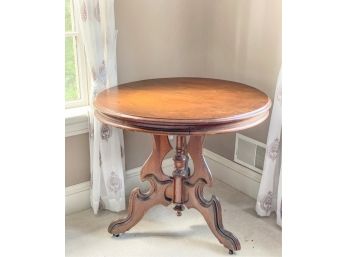 CARVED VICTORIAN ROUND TOP TABLE