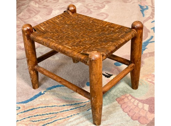 PRIMITIVE FOOTSTOOL WITH WOVEN SEAT
