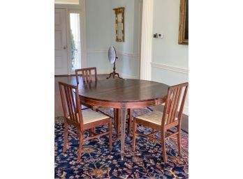 STRING INLAY ROUND TOP DINING TABLE ON SPADE FEET