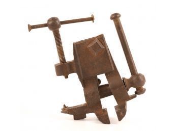 VERY SMALL CAST IRON COUNTER MOUNTED VICE