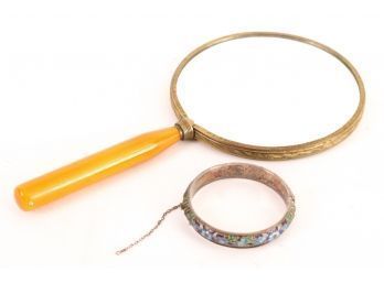 HAND MIRROR and an ENAMELED BRACELET