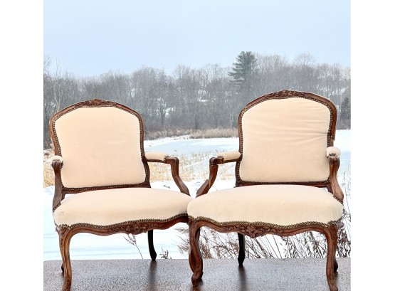 PAIR OF 19th C CARVED FRENCH FAUTEUILS W FLORAL MOTIF