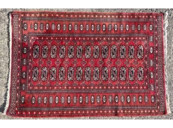 HAND KNOTTED BOKHARA  AREA RUG W MERLOT FIELD