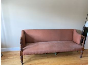CARVED SHERATON UPHOLSTERED SOFA ON REEDED LEGS