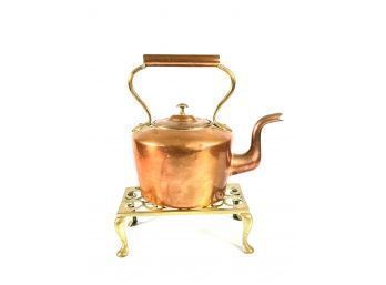 BRASS AND COPPER KETTLE with a BRASS STAND