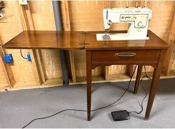 SINGER SEWING MACHINE IN STAND