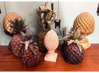 GROUP OF DECORATIVE PINEAPPLES