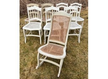 (7) PAINTED CANE SEAT CHAIRS W/ A ROCKER