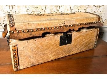 ANTIQUE HIDE AND LEATHER BOUND TRUNK