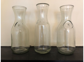 (3) GLASS CARAFES STAMPED