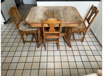 OAK KITCHEN TABLE And (4) CHAIRS - THE 4th IS FOUND