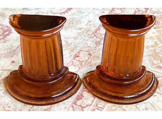 PAIR OF COLUMN-FORM AMBER GLASS BOOKENDS