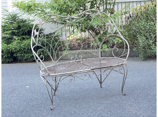 WROUGHT IRON PATIO SETTEE W FLORAL DECORATION