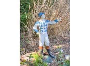 PAINTED CAST CEMENT LAWN JOCKEY IN BLUE & WHITE