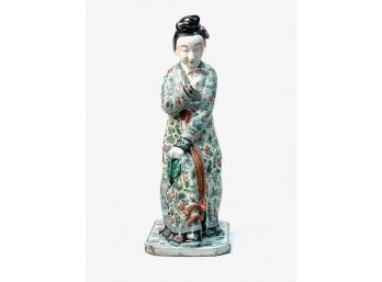 CHINESE PORCELAIN SEATED WOMAN with FLOWER