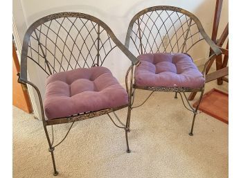 PAIR OF IRON ARMCHAIR CAST with FLORAL MOTIFS