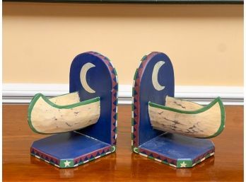 PAIR PAINTED NATIVE AMERICAN CANOE BOOKENDS