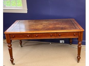 ENGLISH LEATHER TOP WRITING DESK ON TURNED LEGS