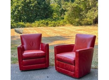 PAIR CRATE & BARREL RED LEATHER SWIVEL CHAIRS