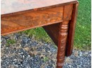 (19th C) DROP LEAF TABLE ON HEAVILY CARVED LEGS