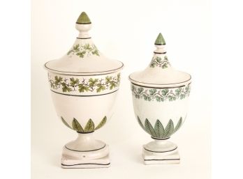 (2) FAIENCE COVERED URNS with VINE MOTIF