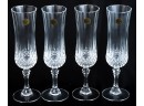 PAIR CRYSTAL DECANTERS W/ (4) CHAMPAGNE FLUTES