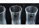 PAIR CRYSTAL DECANTERS W/ (4) CHAMPAGNE FLUTES