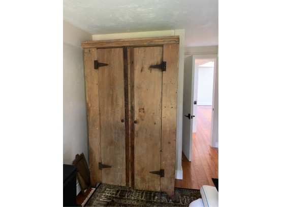 VERY LARGE COUNTRY ARMOIRE WITH TRACES OF PAINT