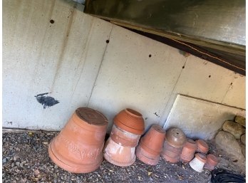 MISC GROUP OF TERRACOTTA AND PLASTIC PLANTERS