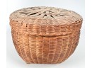 (2) COVERED WOVEN BASKETS