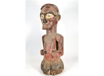 CARVED SONGYE FIGURE OF A RED MAN