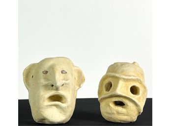PAIR OF PRE COLUMBIAN POTTERY HEADS
