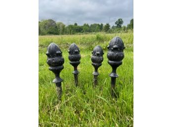 (4) TORCH FORM CAST IRON GARDEN STAKES