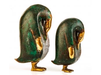 PAIR OF BRASS MOUNTED CARVED WOOD PENGUINS