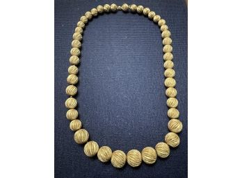 14k GOLD GRADUATING FLUTED BEAD NECKLACE