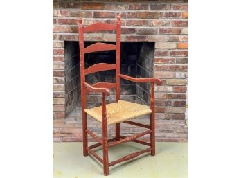 SAUSAGE TURNED LADDER BACK ARMCHAIR IN RED WASH