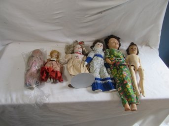 6  Assorted Dolls  Including 1 Shirley Temple Doll With Pin