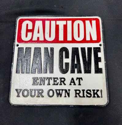 45. Cast Iron Mancave Sign