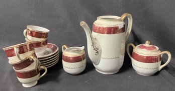 56. Antique Porcelain Tea Set