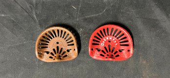73. Cast Iron Pair Of Farmall Advertising Pieces