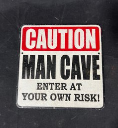 61.  Cast Iron Man Cave Sign