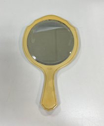 126. Art Deco Yellow Pyralin Hand Mirror