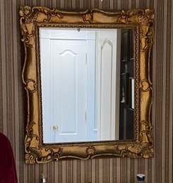 27. Antique Decorative Rococo Style Giltwood Mirror